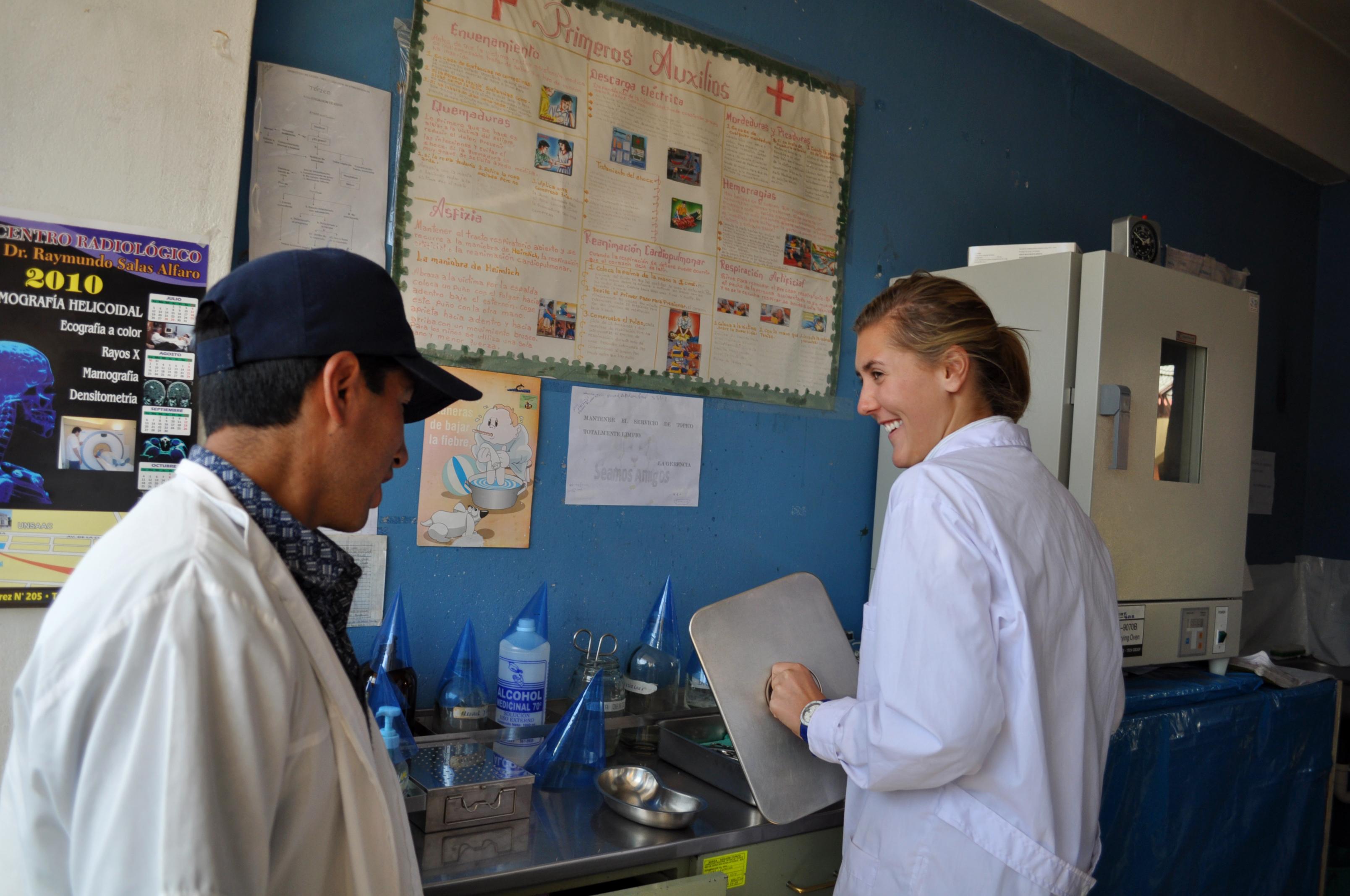 Local doctor and Projects Abroad intern share a joke whilst completing her medicine and nursing internship in Peru. A local doctor and Projects Abroad intern are seen sharing a joke during her medicine and nursing internship in Peru.